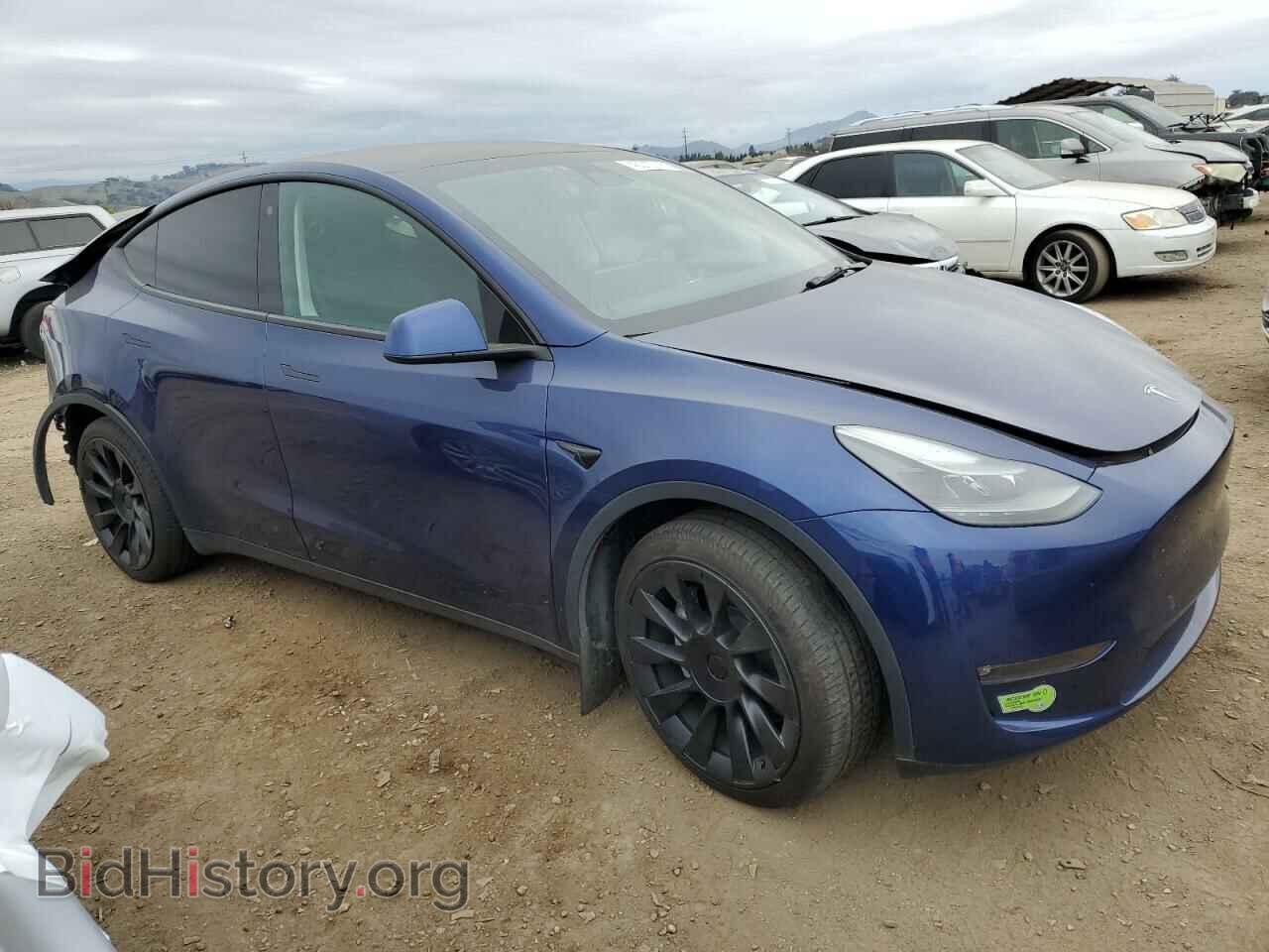 2023 TESLA MODEL Y - VIN: 7SAYGDEE3PF667539 - Photo 4