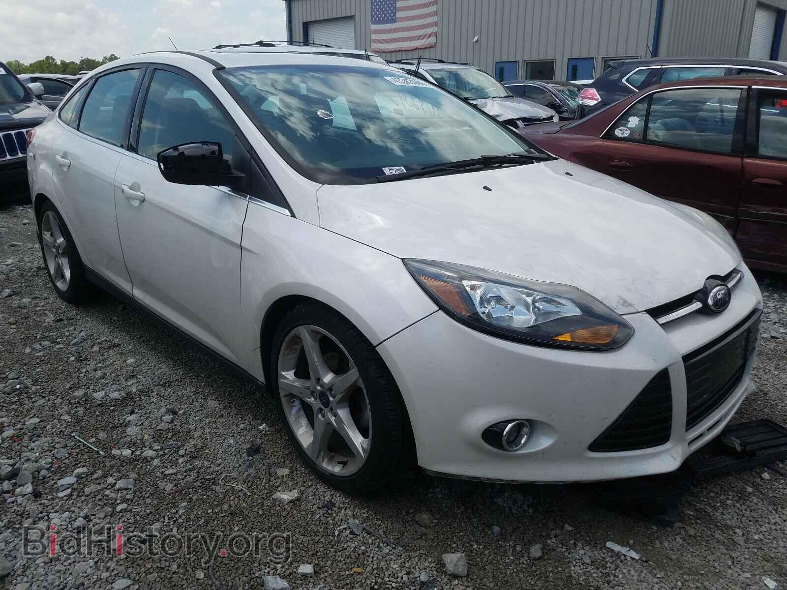 Фотография 1FADP3J27EL405203 - FORD FOCUS 2014
