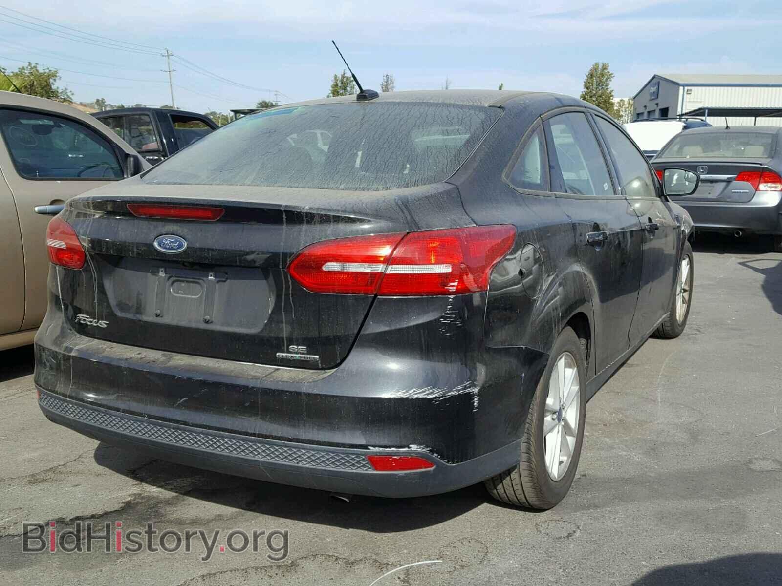 2015 FORD FOCUS - VIN: 1FADP3F28FL242927 - Photo 4