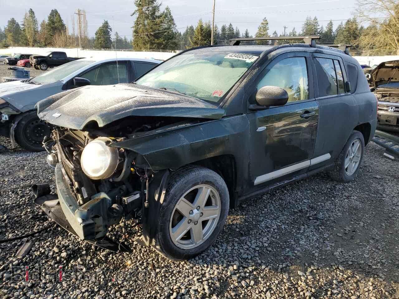 Photo 1J4NF1FB9AD643048 - JEEP COMPASS 2010