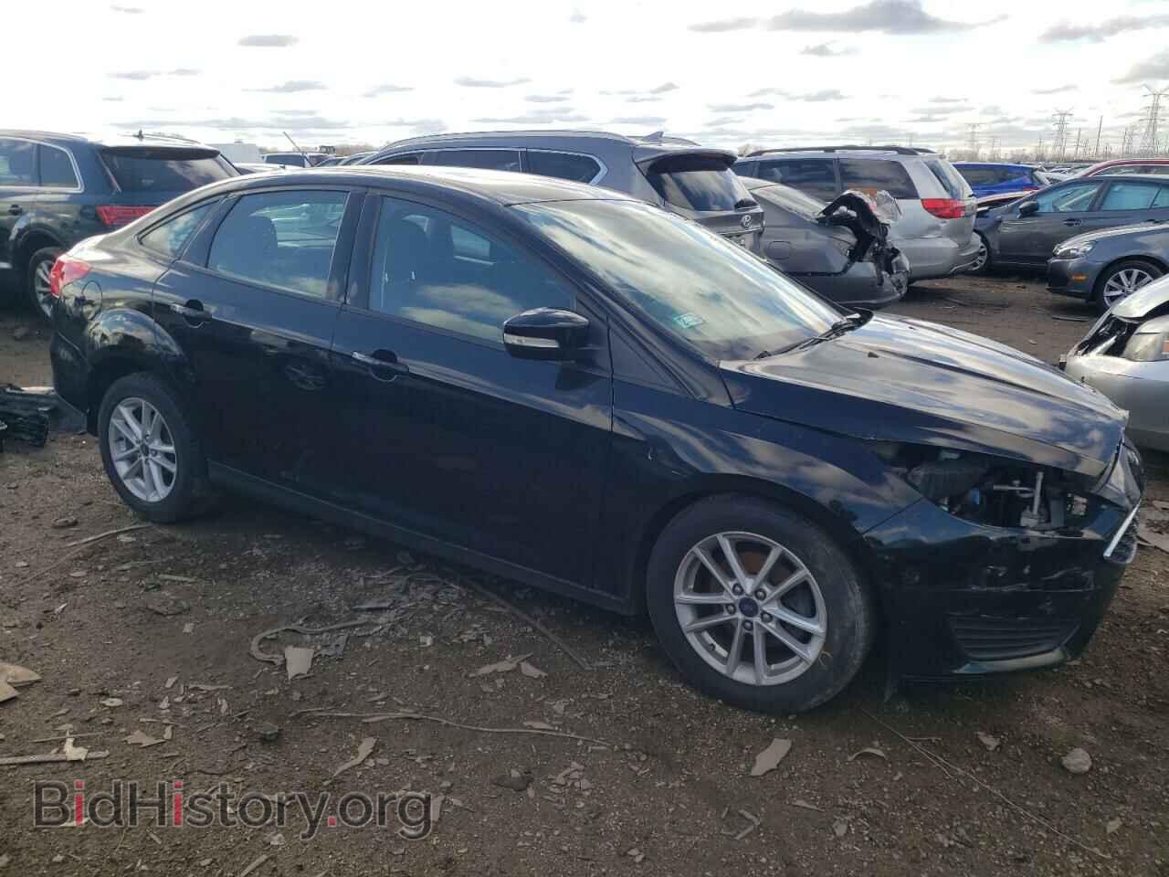 2017 FORD FOCUS - VIN: 1FADP3F24HL261803 - Photo 4