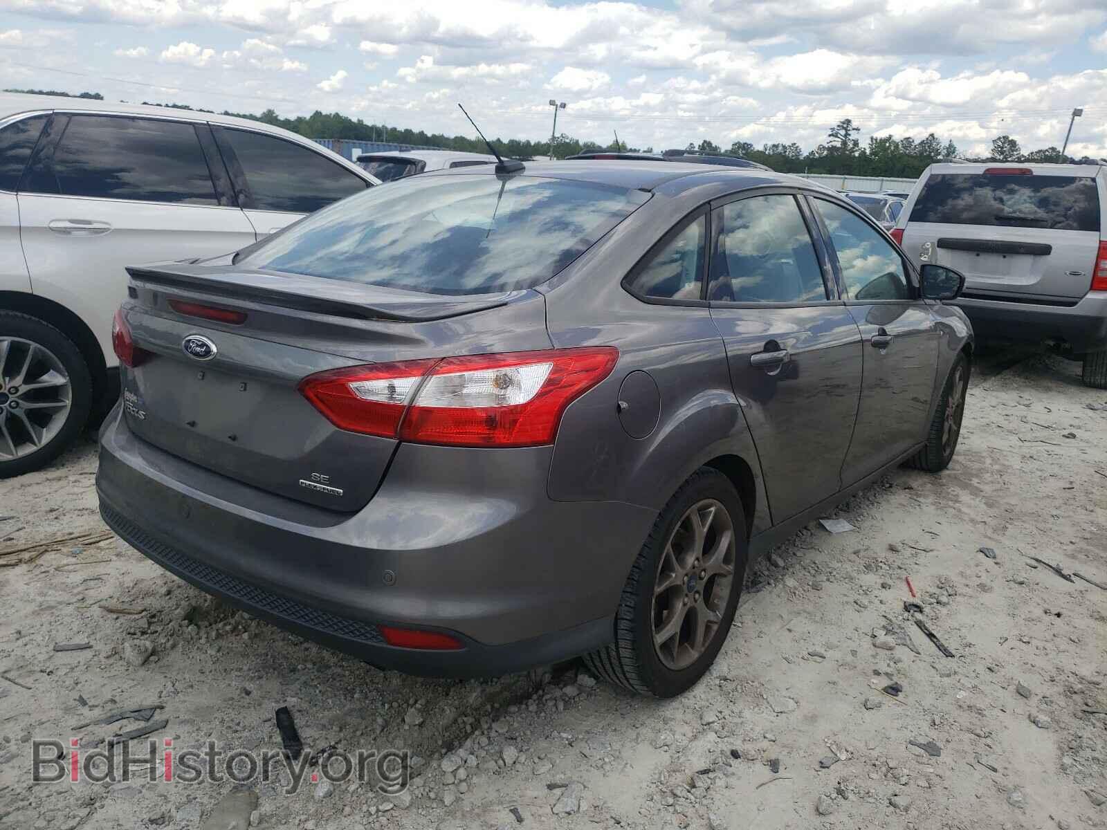 2014 FORD FOCUS - VIN: 1FADP3F28EL458193 - Photo 4