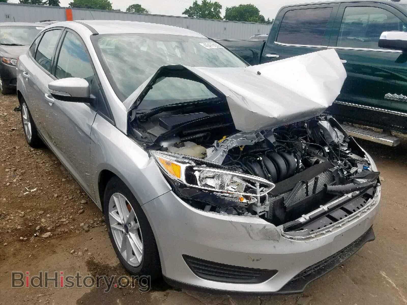 Фотография 1FADP3F20JL267085 - FORD FOCUS SE 2018