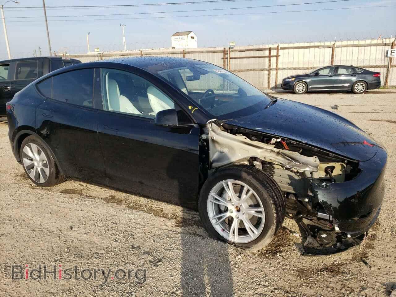 2023 TESLA MODEL Y - VIN: 7SAYGDED7PF942241 - Photo 4