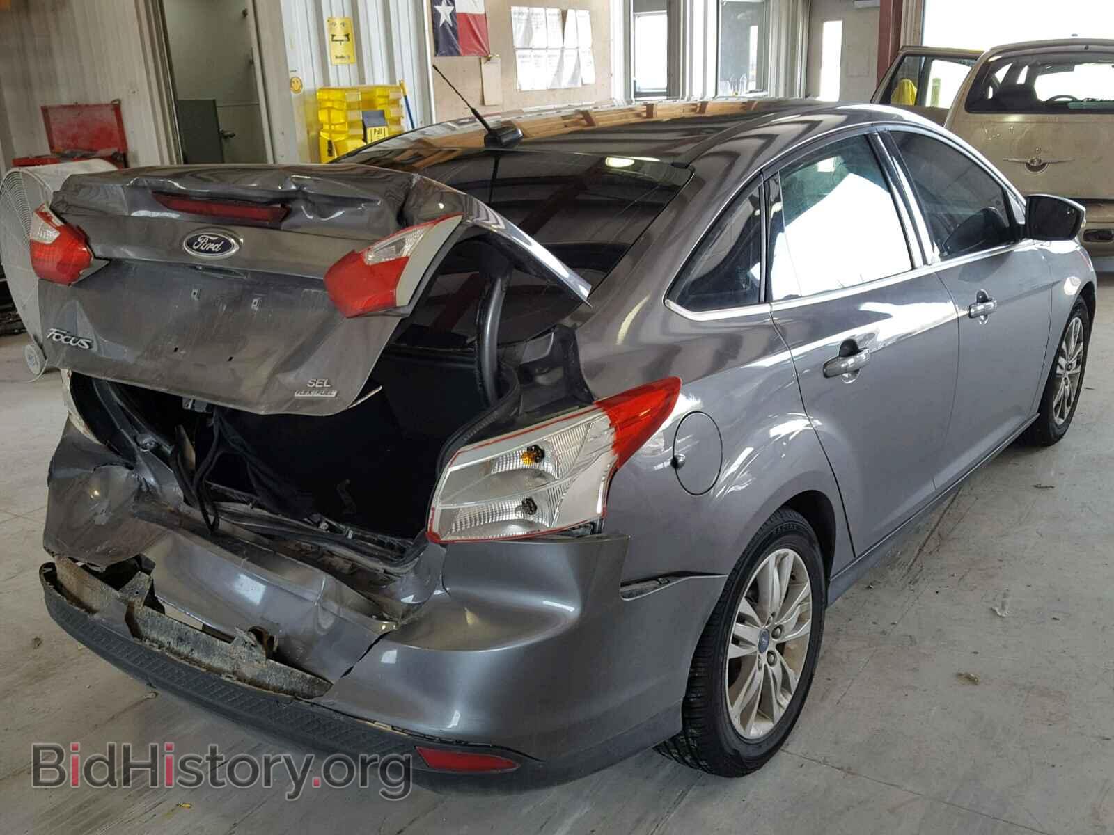 2012 Ford FOCUS (VIN 1FAHP3H26CL394425) — photo 4 of 10