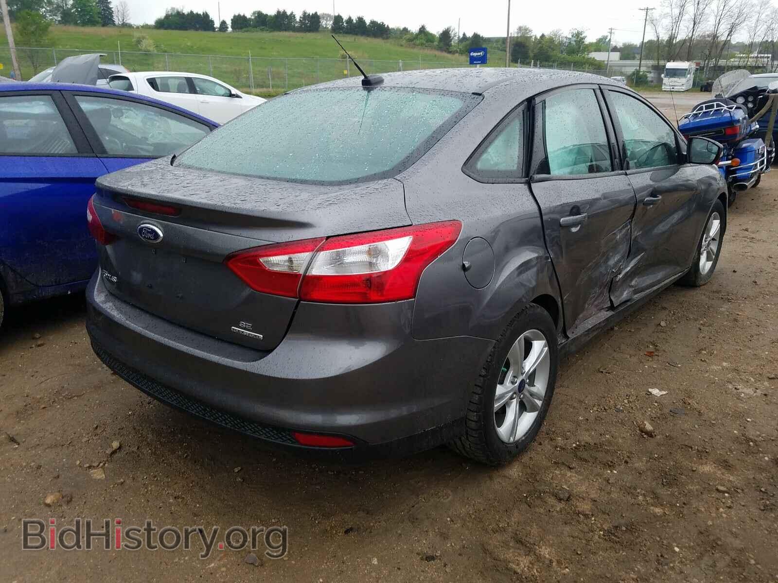 2014 FORD FOCUS - VIN: 1FADP3F20EL379567 - Photo 4