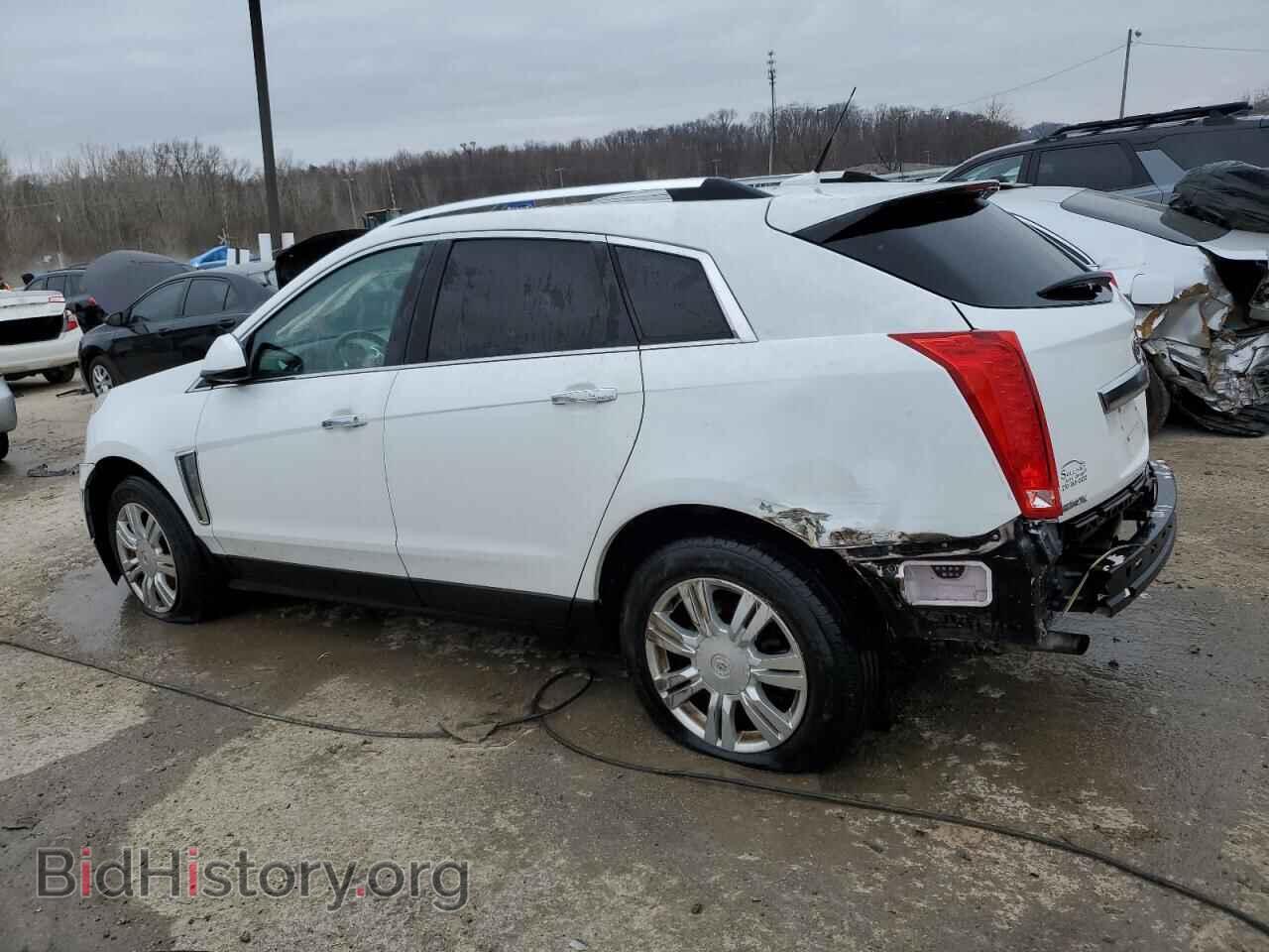 2013 CADILLAC SRX - VIN: 3GYFNCE35DS599101 - Фото 2
