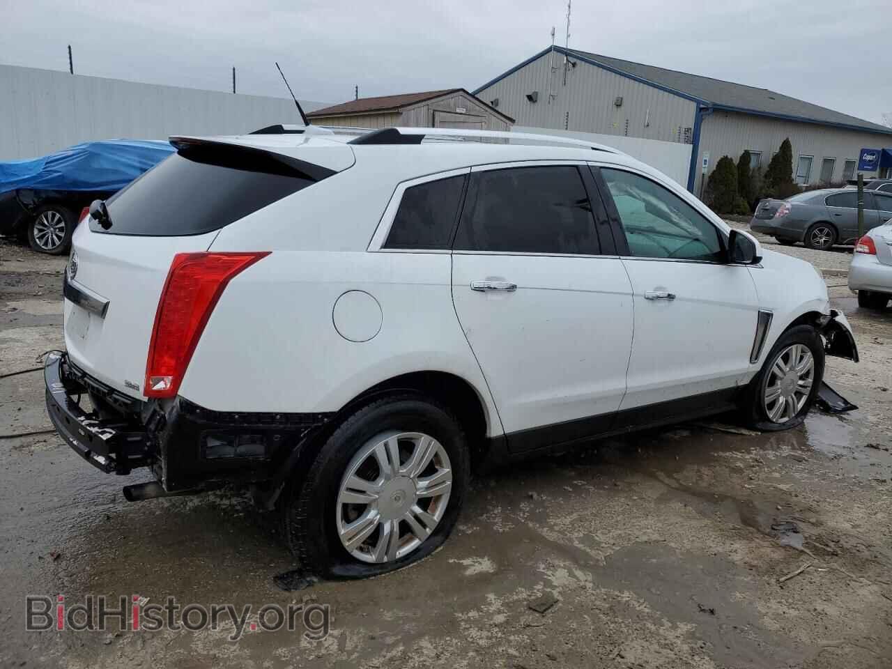 2013 CADILLAC SRX - VIN: 3GYFNCE35DS599101 - Фото 3
