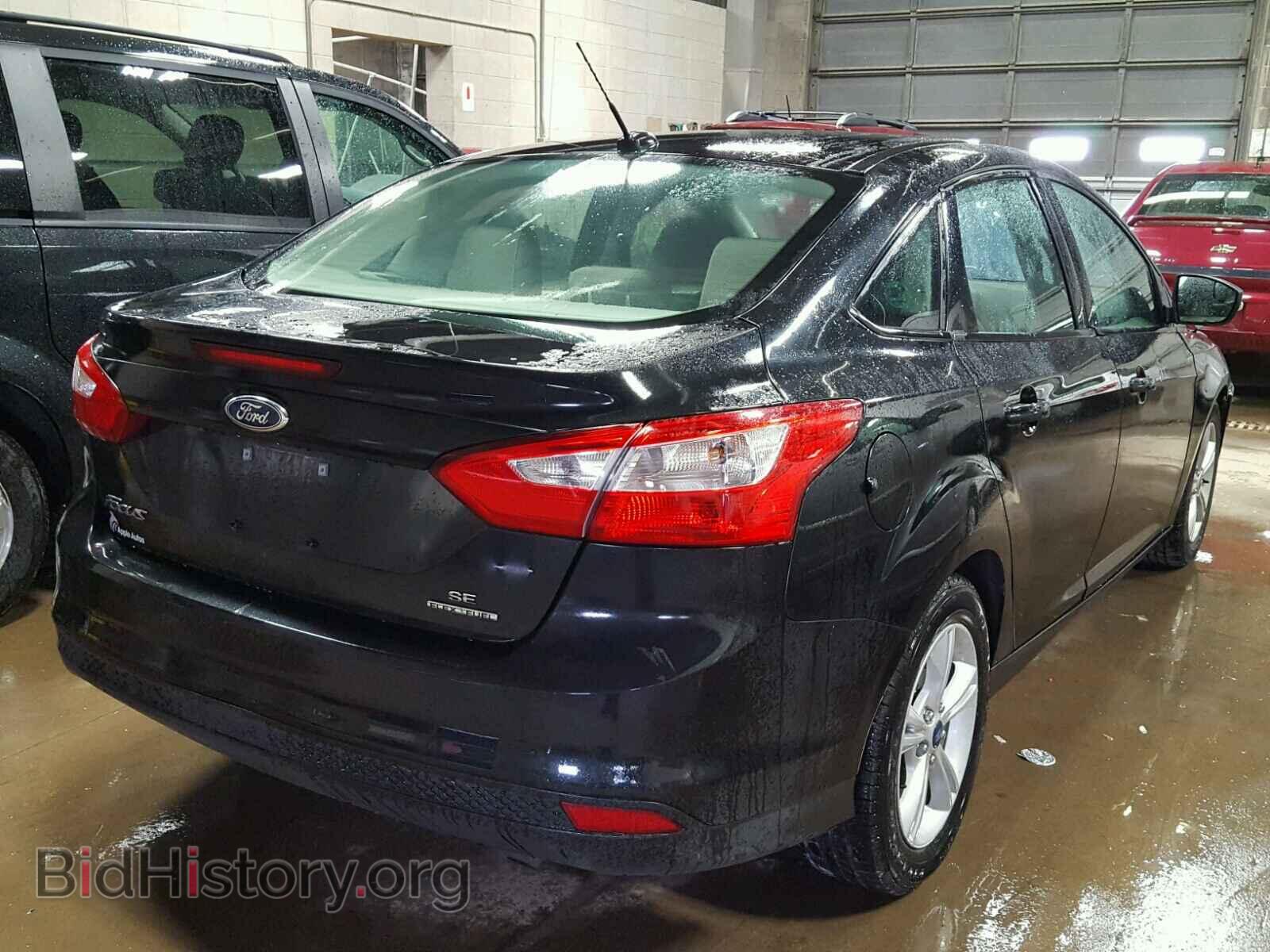 2014 FORD FOCUS - VIN: 1FADP3F27EL441594 - Photo 4