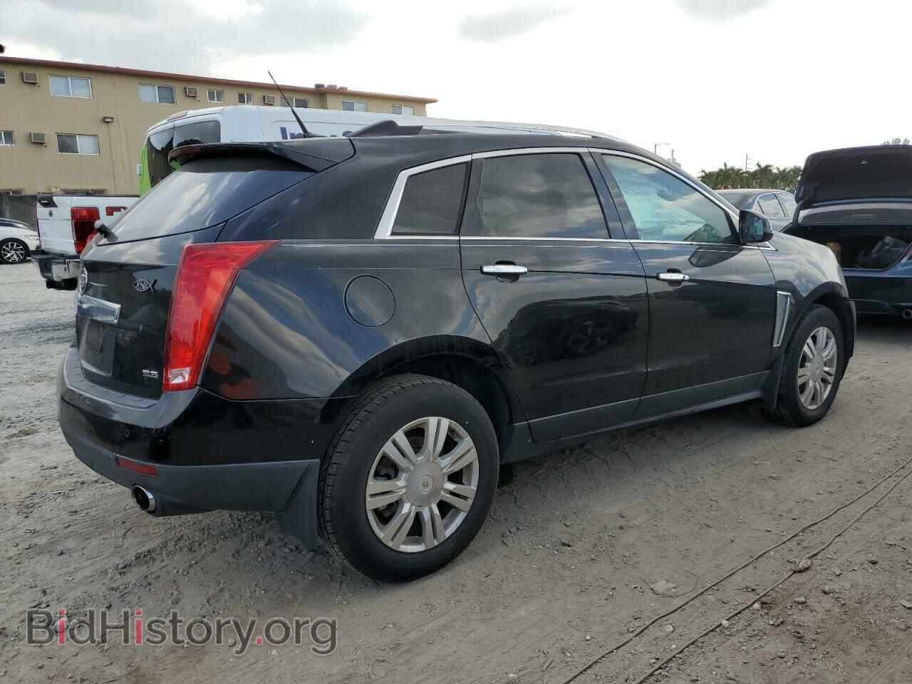 2013 CADILLAC SRX - VIN: 3GYFNCE30DS592878 - Фото 3