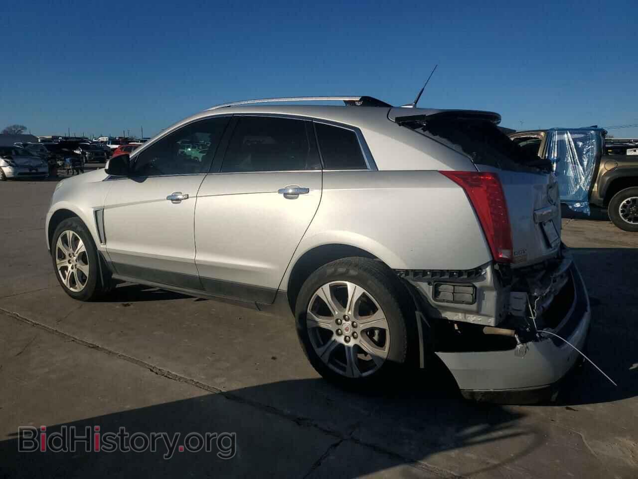 2014 CADILLAC SRX - VIN: 3GYFNCE30ES583972 - Фото 2