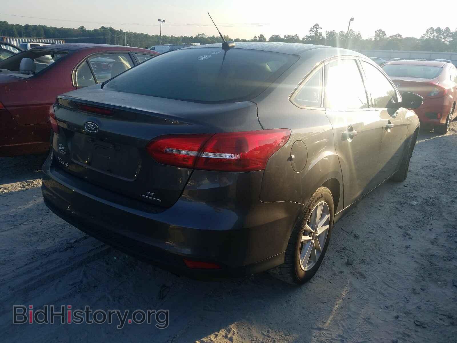 2016 FORD FOCUS - VIN: 1FADP3F22GL300595 - Photo 4