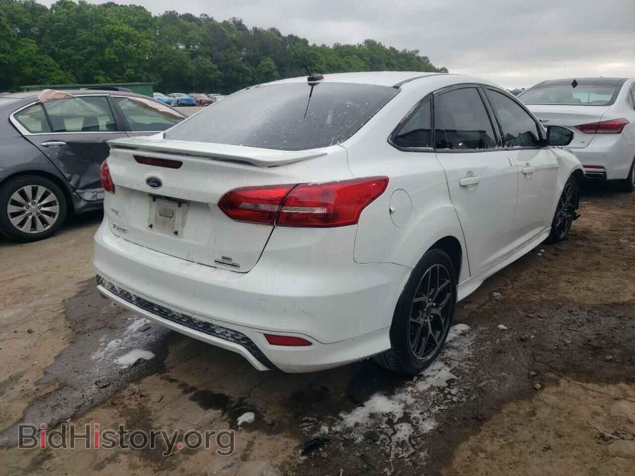 2015 FORD FOCUS - VIN: 1FADP3F20FL338521 - Photo 4