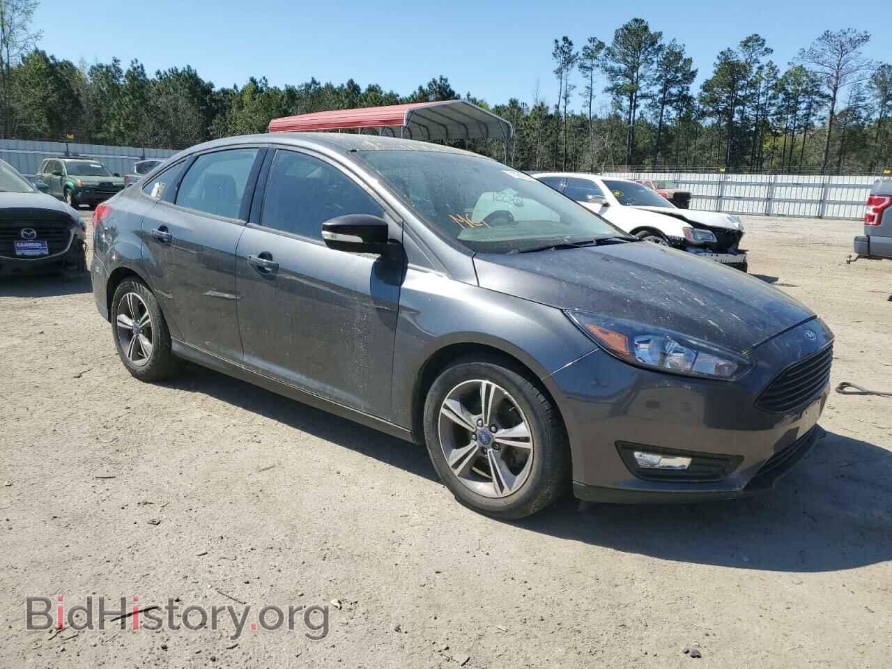 2017 FORD FOCUS - VIN: 1FADP3FE0HL274557 - Photo 4