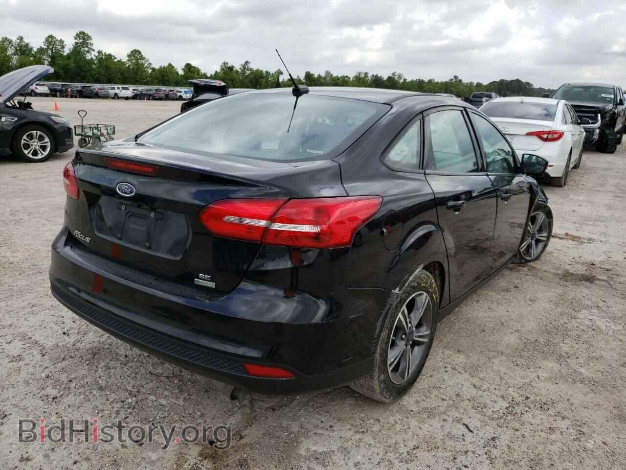 2017 FORD FOCUS - VIN: 1FADP3FEXHL263887 - Photo 4