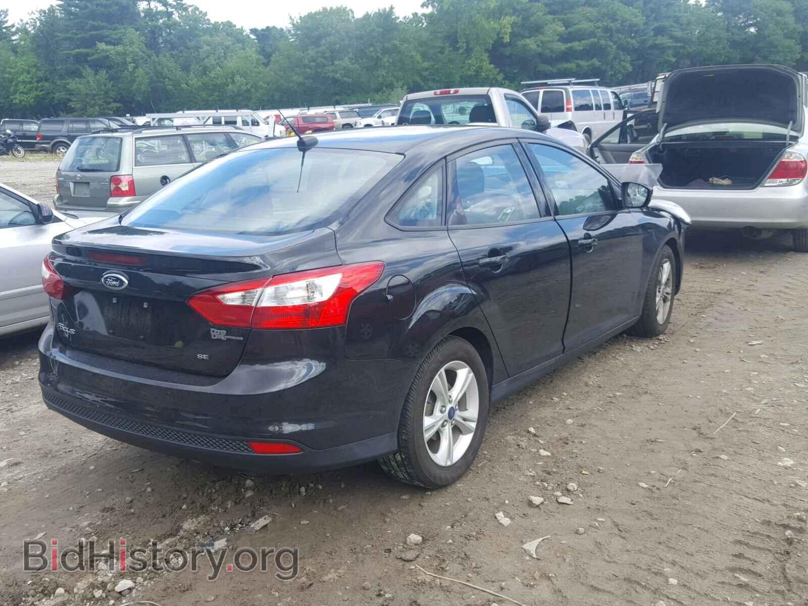 2014 FORD FOCUS - VIN: 1FADP3F22EL404680 - Photo 4