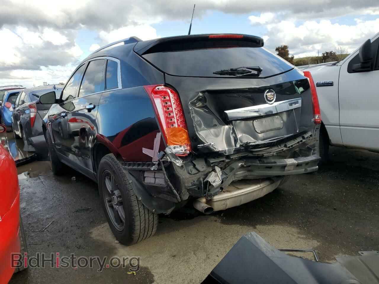 2014 CADILLAC SRX - VIN: 3GYFNBE32ES629716 - Фото 2