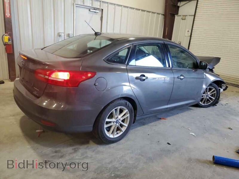 2015 Ford FOCUS (VIN 1FADP3F2XFL214174) — фото 3 из 13