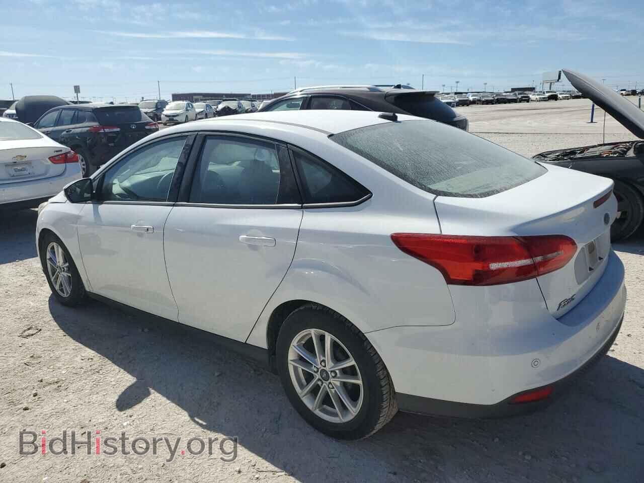 2016 FORD FOCUS - VIN: 1FADP3F21GL306758 - Фото 2