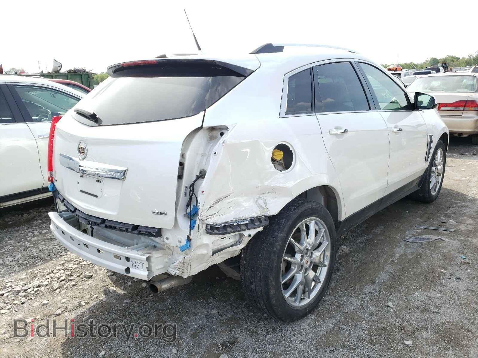 2013 CADILLAC SRX - VIN: 3GYFNDE37DS649003 - Фото 4