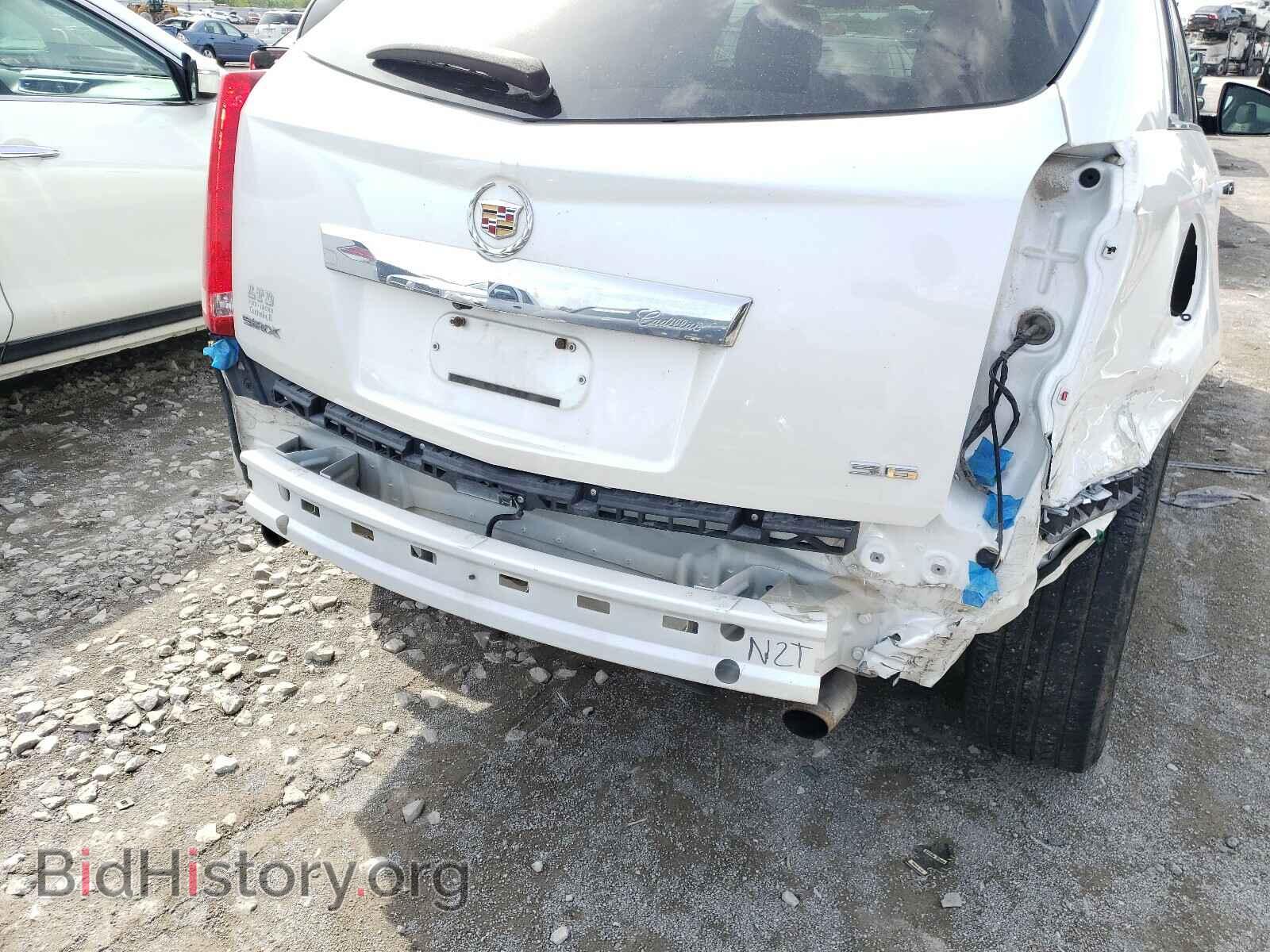 2013 CADILLAC SRX - VIN: 3GYFNDE37DS649003 - Фото 9