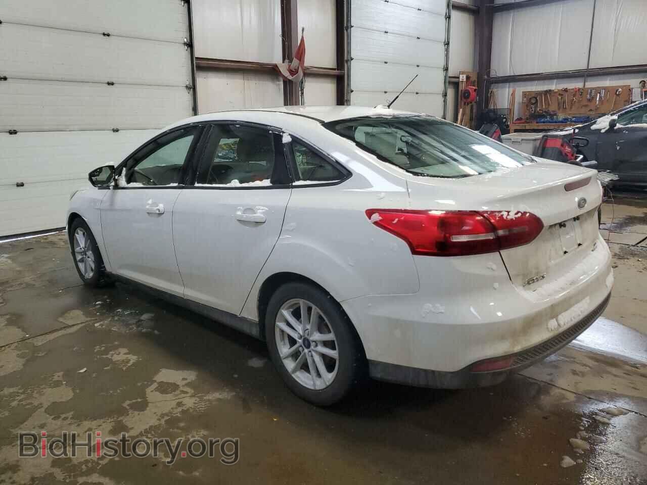 2016 FORD FOCUS - VIN: 1FADP3F22GL316389 - Фото 2