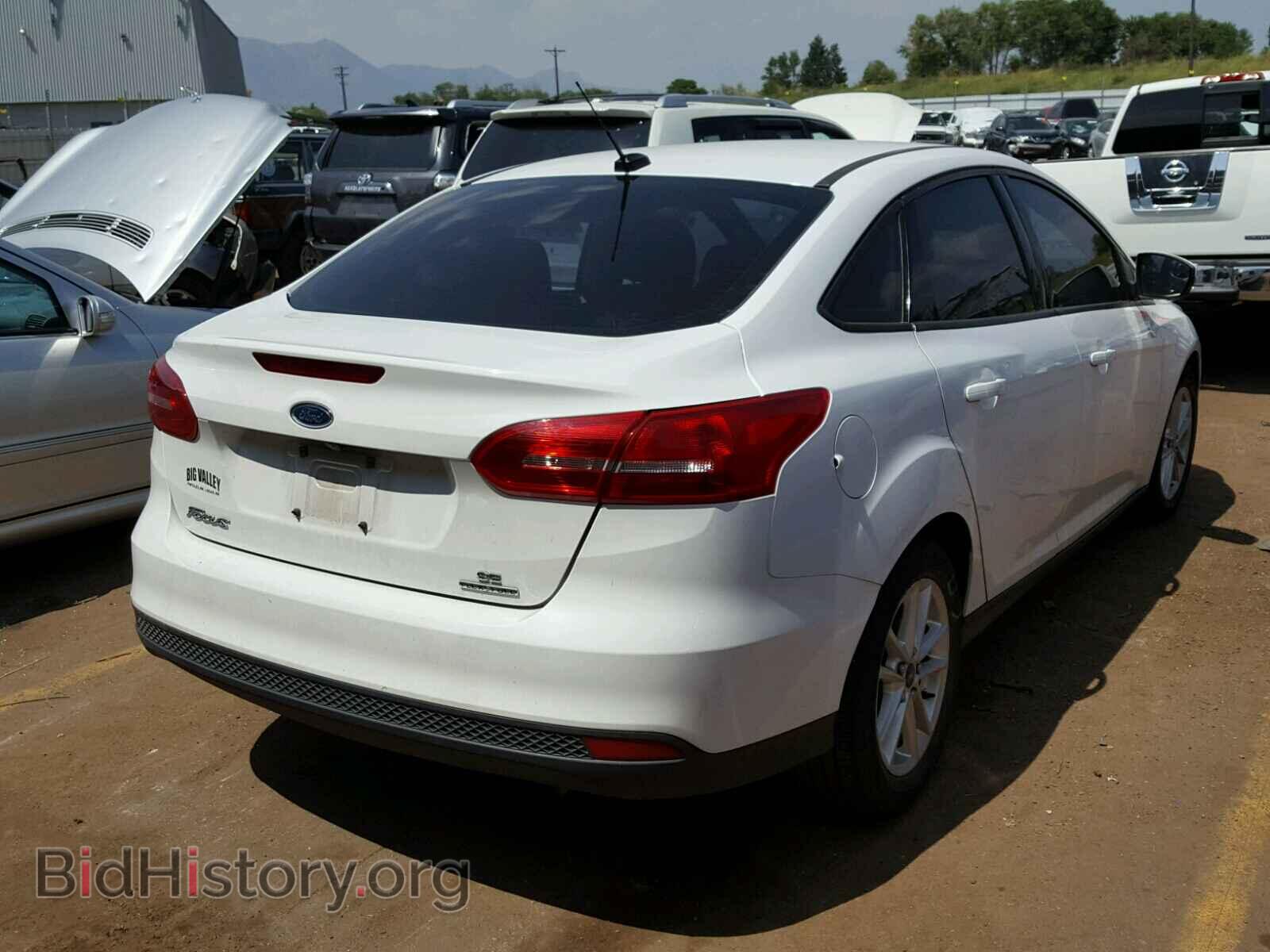 2015 FORD FOCUS - VIN: 1FADP3F21FL328936 - Photo 4