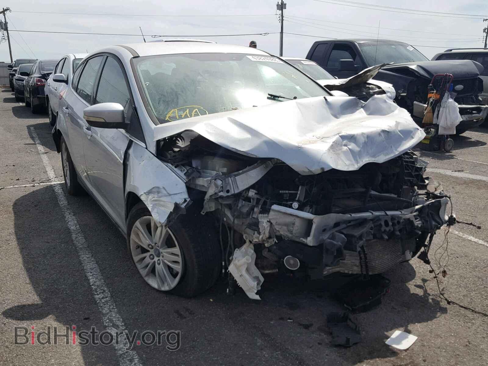 2012 Ford FOCUS Focus SEL (VIN 1FAHP3M28CL333485) — фото 1 из 10, Copart, повреждение: передняя часть