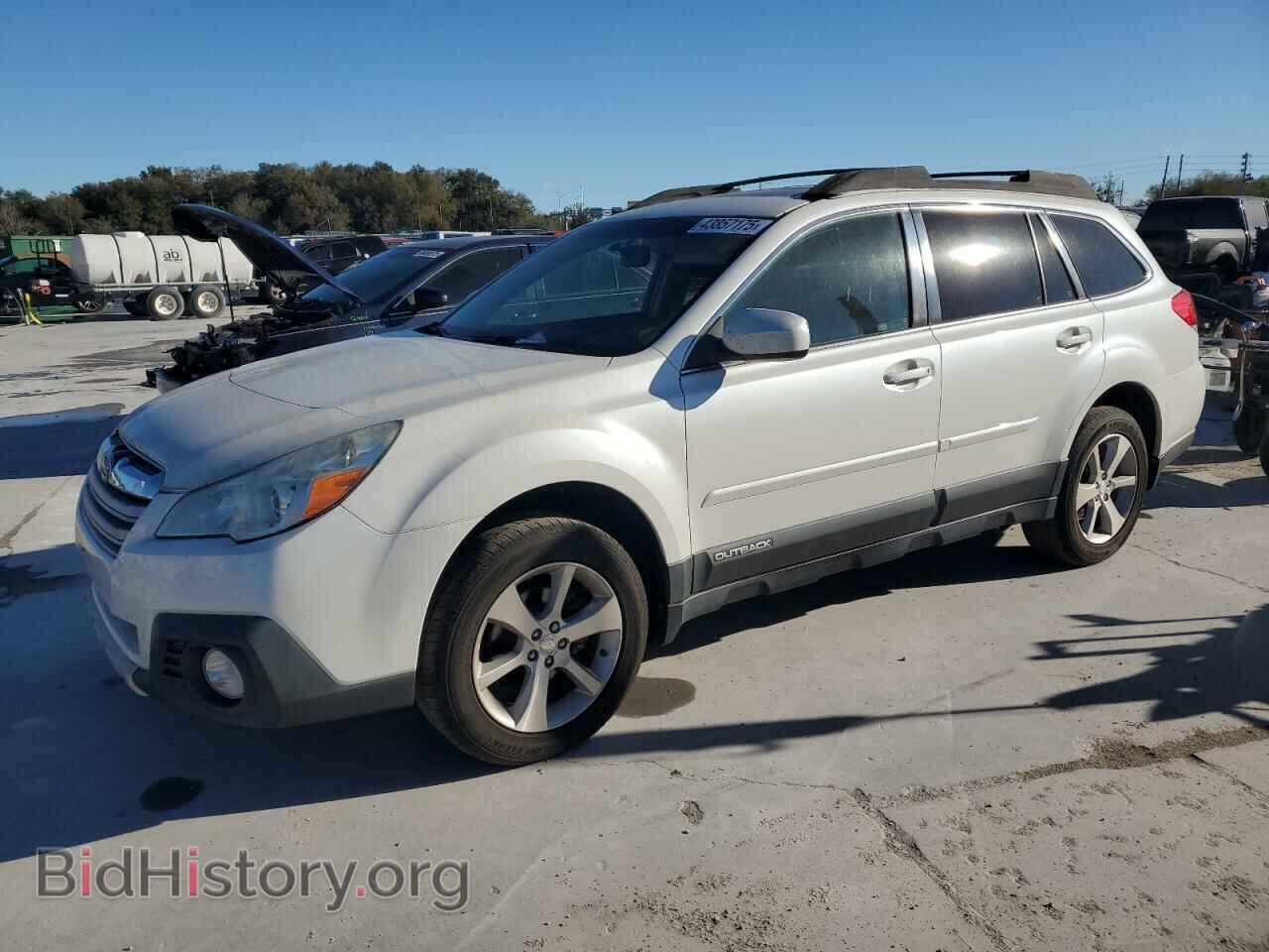 Фотография 4S4BRBKC7D3295678 - SUBARU OUTBACK 2013