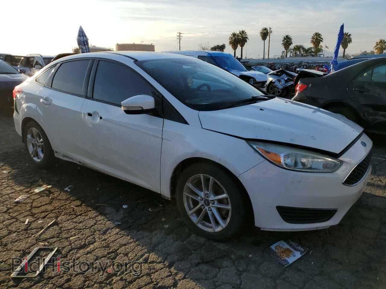 2015 FORD FOCUS - VIN: 1FADP3F21FL295940 - Photo 4