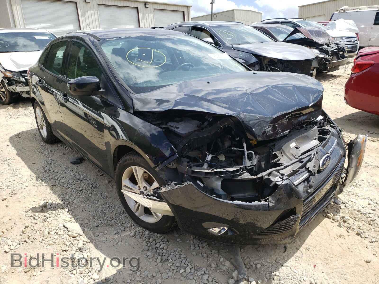 Photo 1FAHP3F29CL377668 - FORD FOCUS 2012