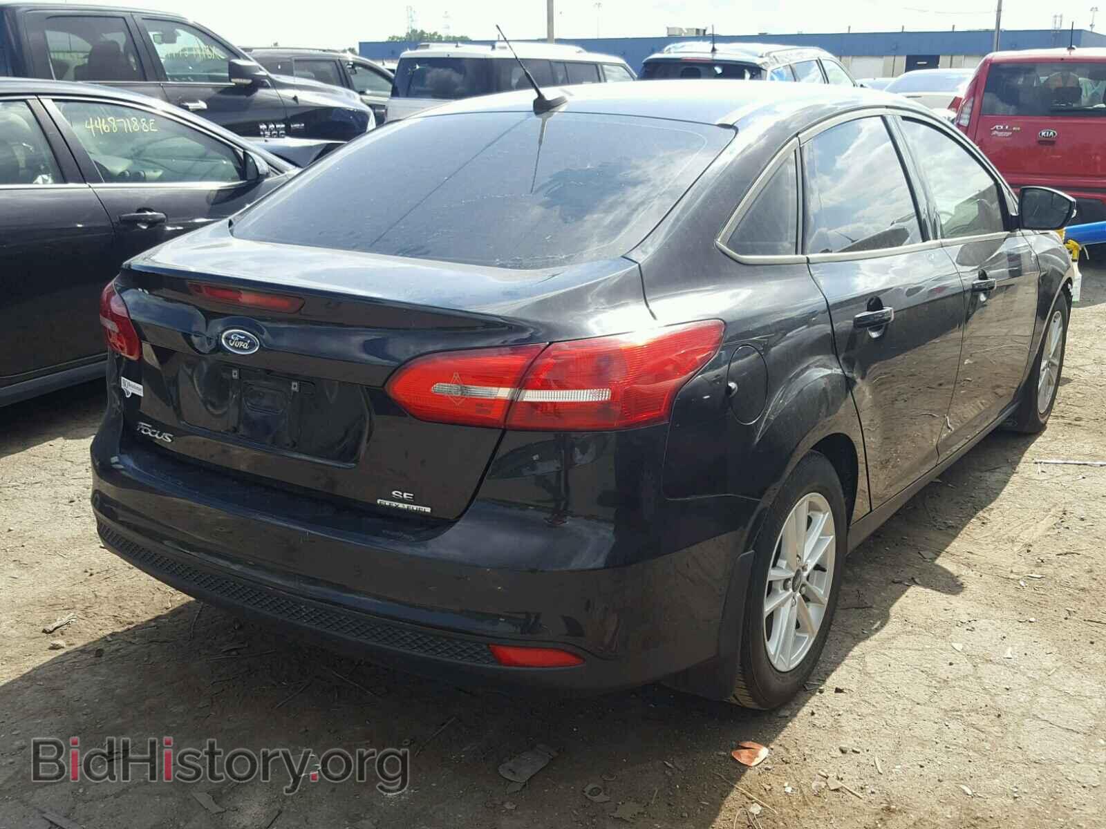 2016 FORD FOCUS - VIN: 1FADP3F21GL201749 - Photo 4