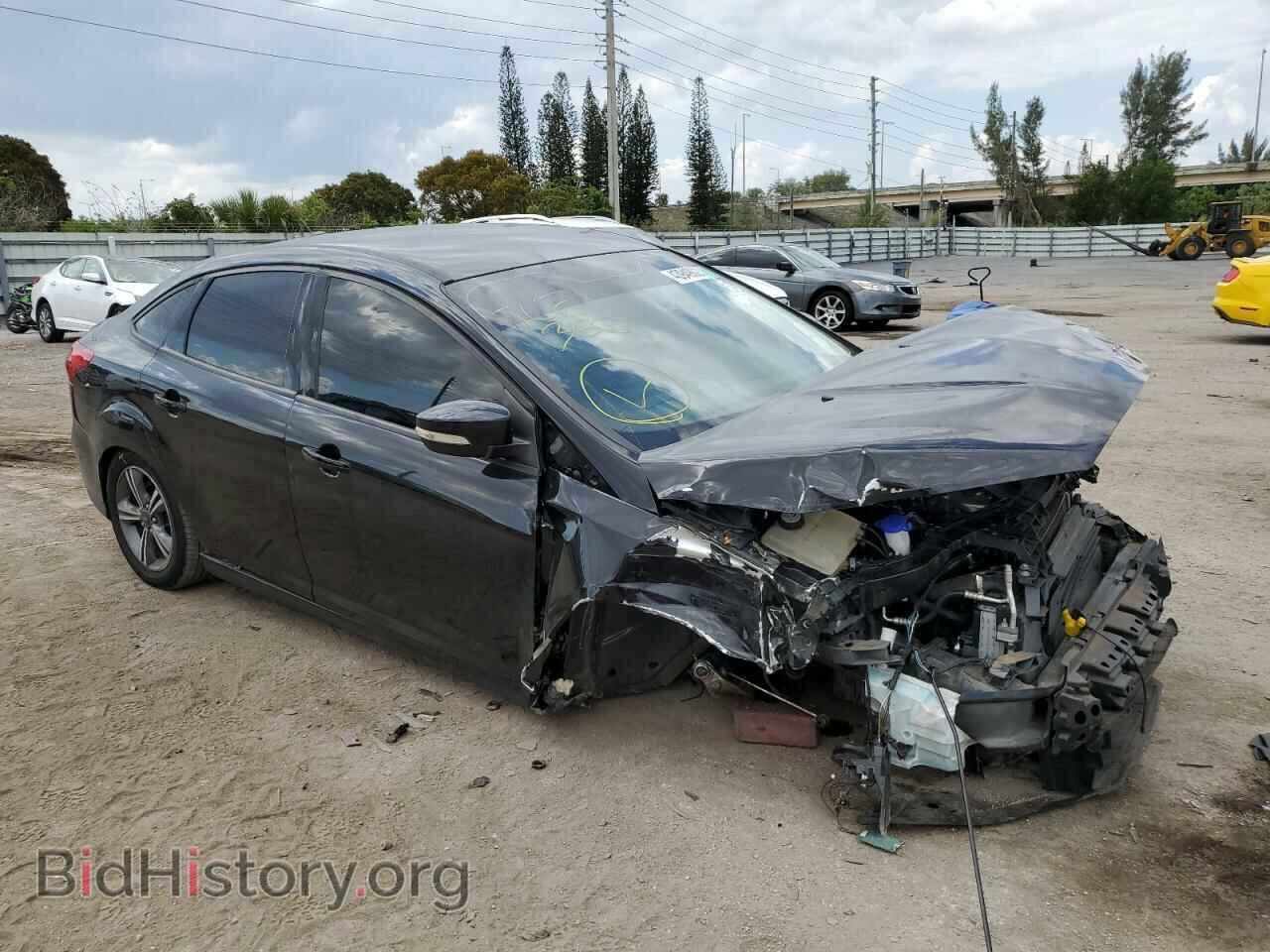 2017 FORD FOCUS - VIN: 1FADP3FE0HL345837 - Photo 4