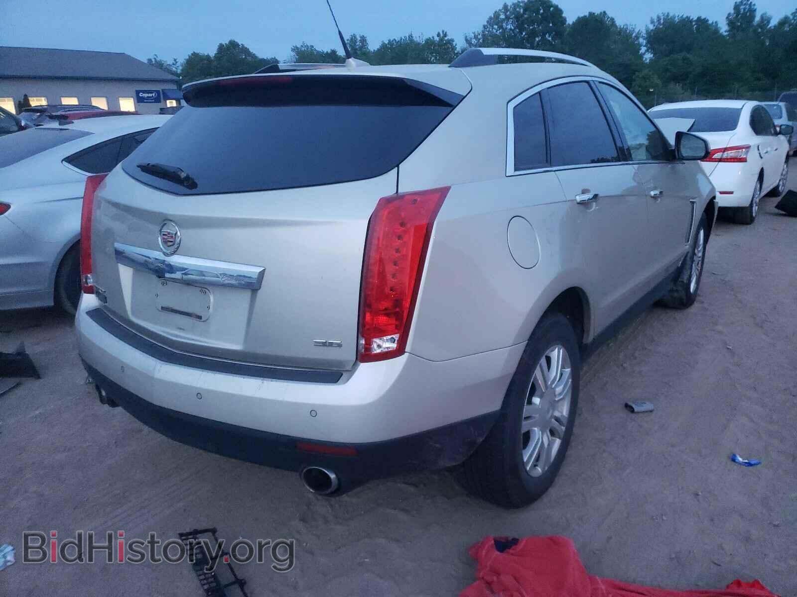 2013 CADILLAC SRX - VIN: 3GYFNCE3XDS609332 - Фото 4