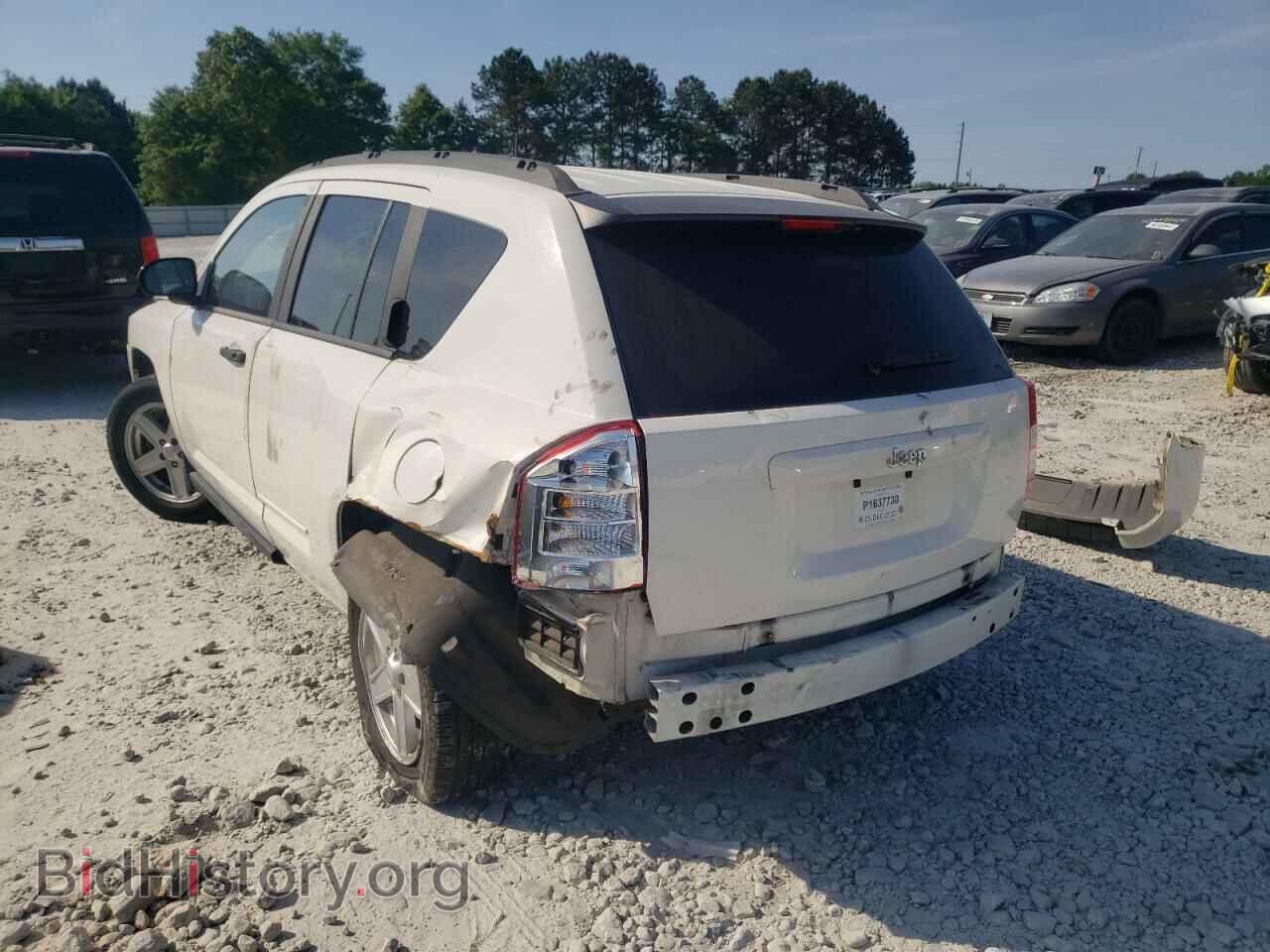2010 JEEP COMPASS - VIN: 1J4NT4FA0AD504749 - Фото 3