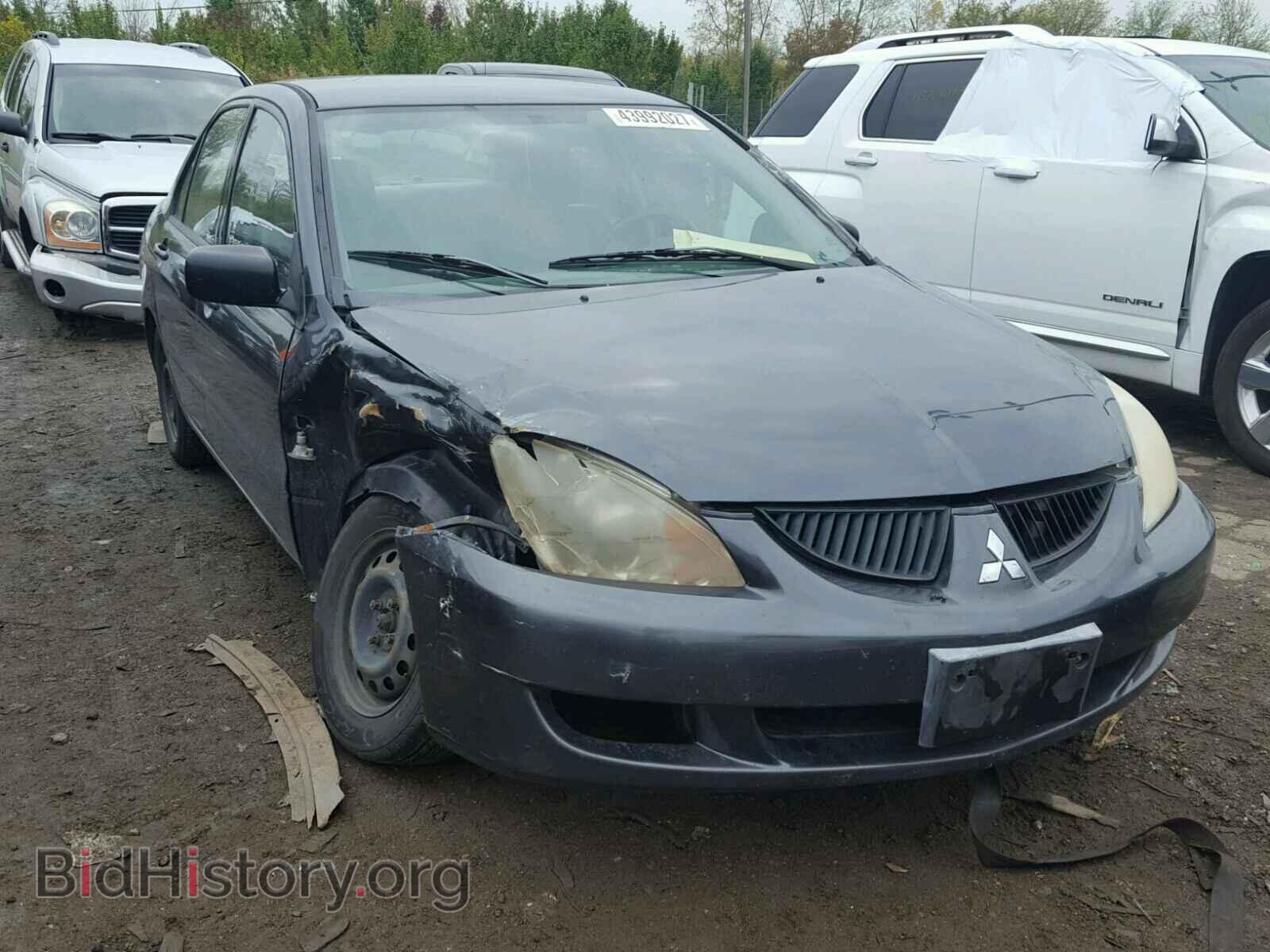 Photo 1J3AJ26E74U069023 - MITSUBISHI LANCER 2004