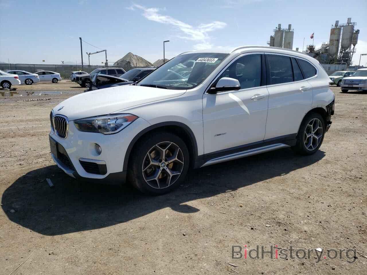 Фотография WBXHT3C32G5E54478 - BMW X1 2016