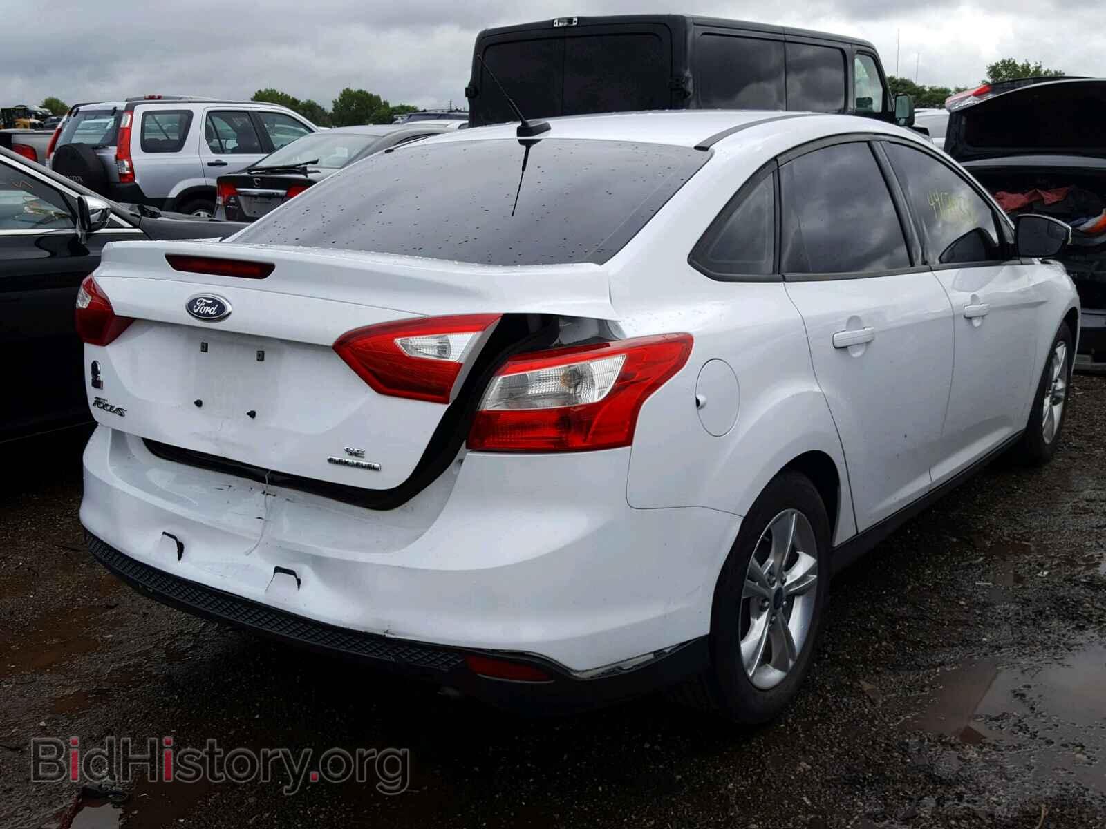 2014 FORD FOCUS - VIN: 1FADP3F22EL162893 - Photo 4