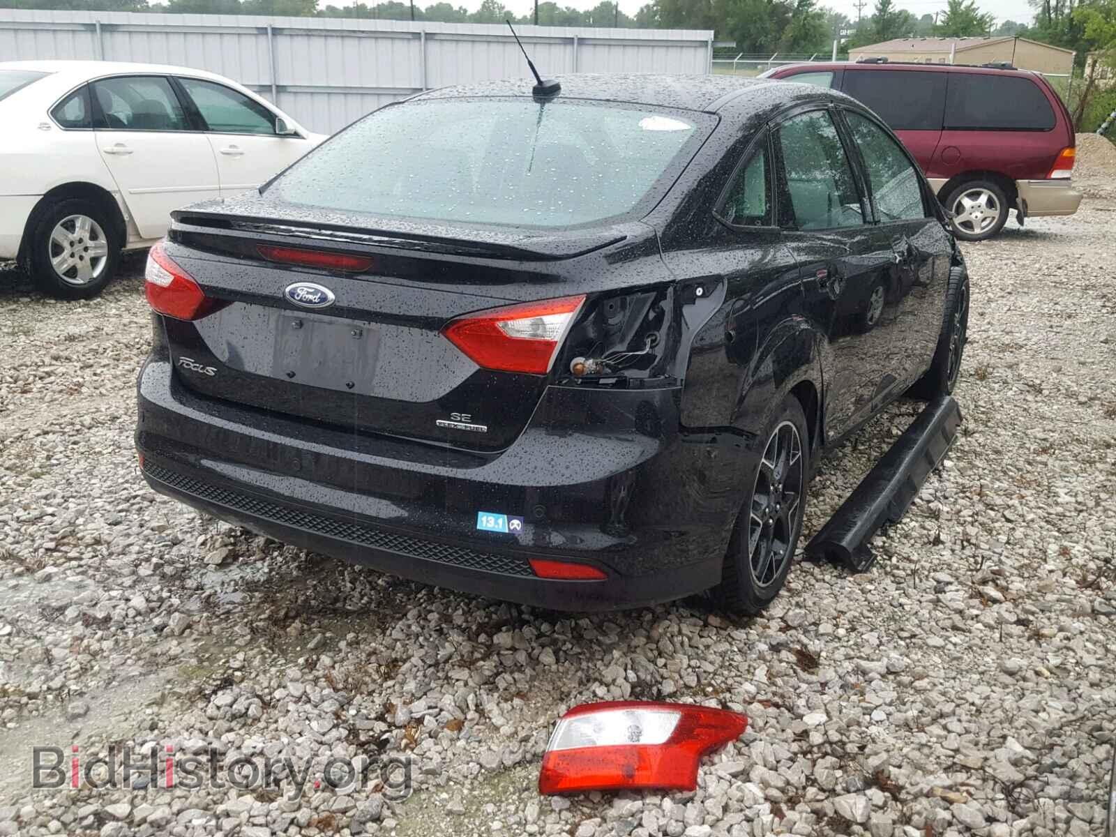 2014 FORD FOCUS - VIN: 1FADP3F2XEL410243 - Photo 4