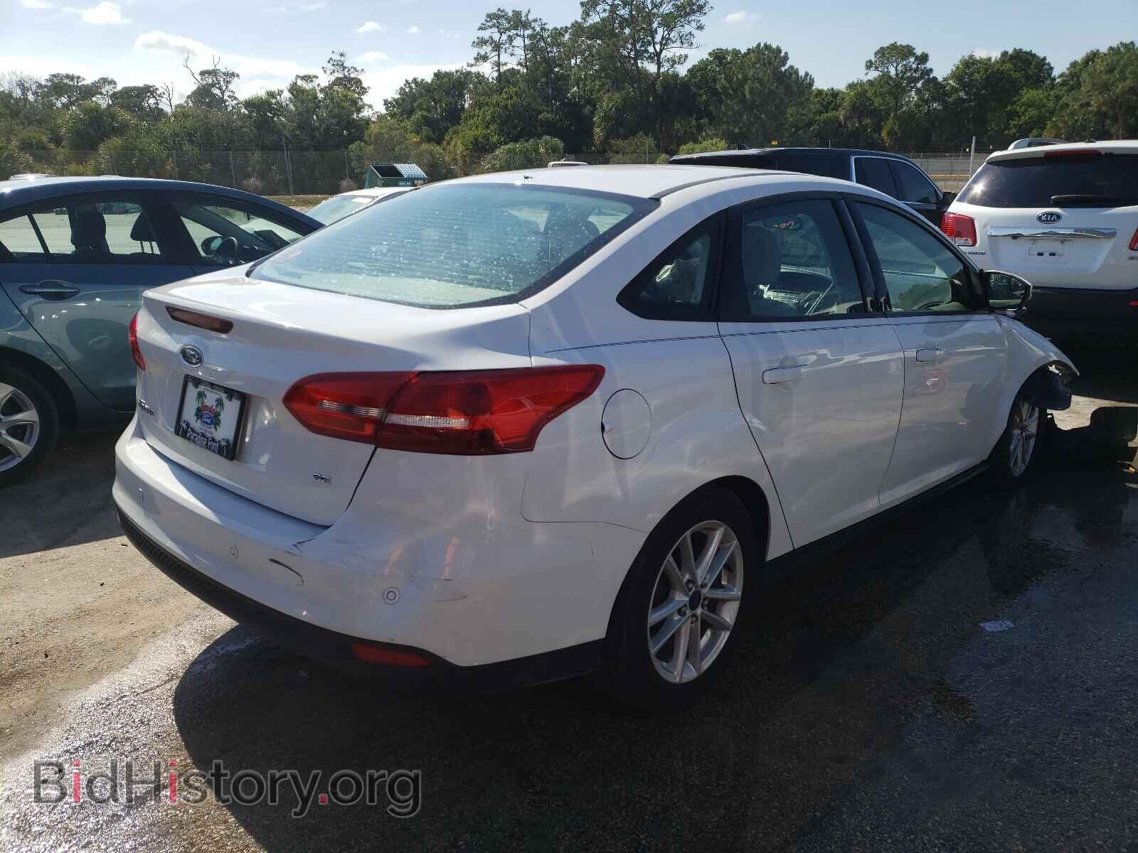 2015 FORD FOCUS - VIN: 1FADP3F2XFL322150 - Photo 4