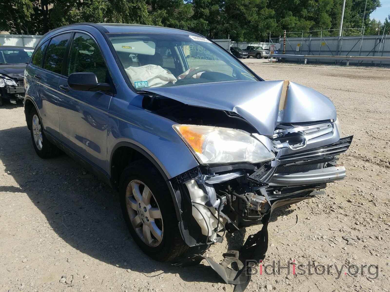 Photo JHLRE48547C104504 - HONDA CRV 2007