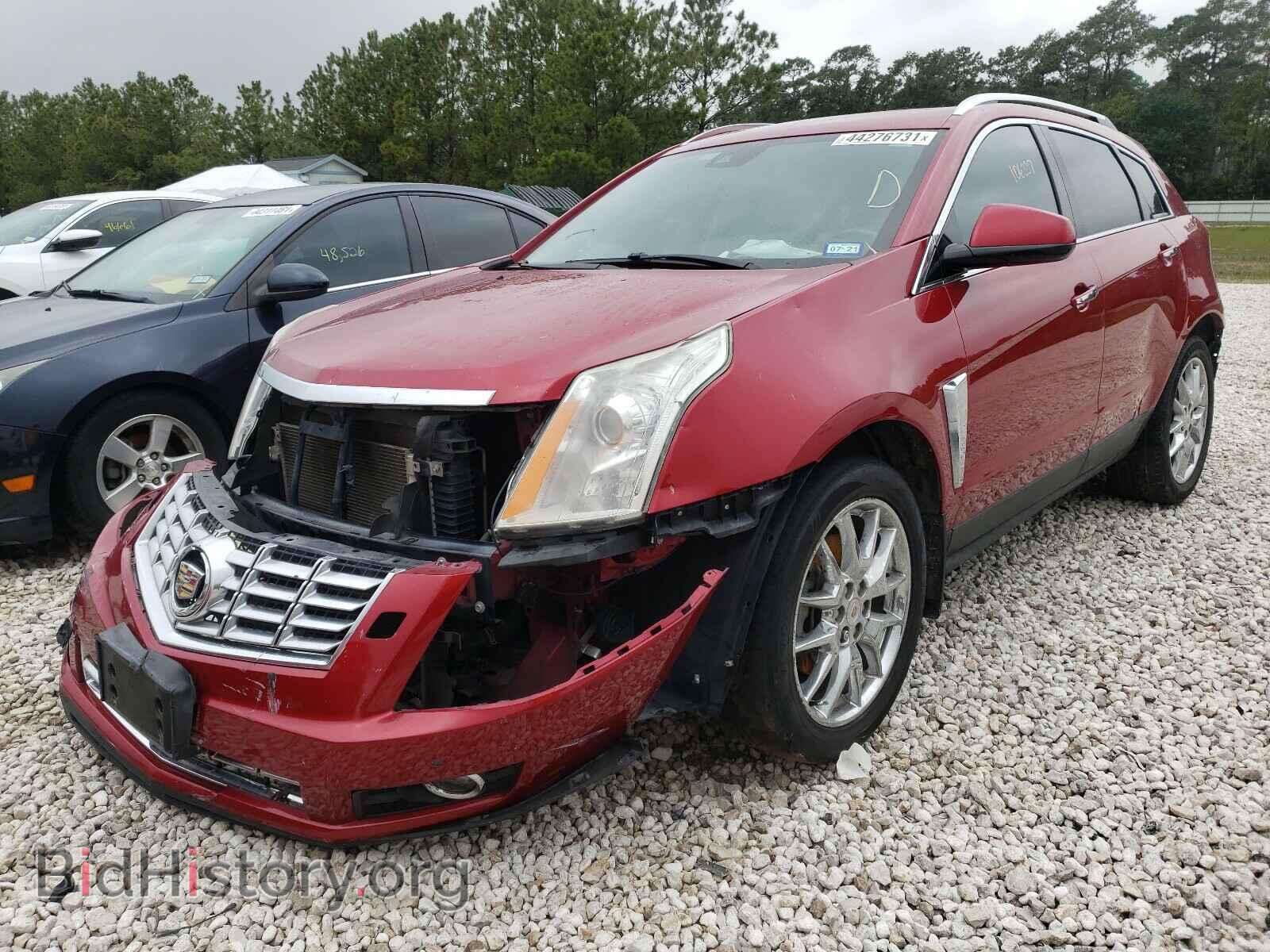 2014 CADILLAC SRX - VIN: 3GYFNDE30ES554946 - Фото 2