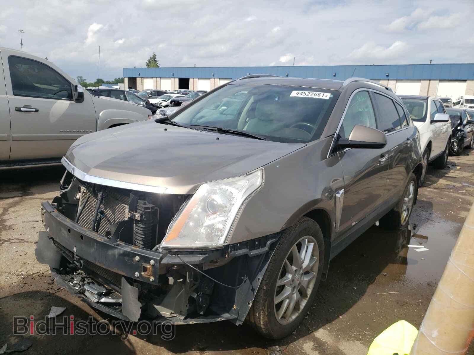 2014 CADILLAC SRX - VIN: 3GYFNCE38ES548869 - Фото 2