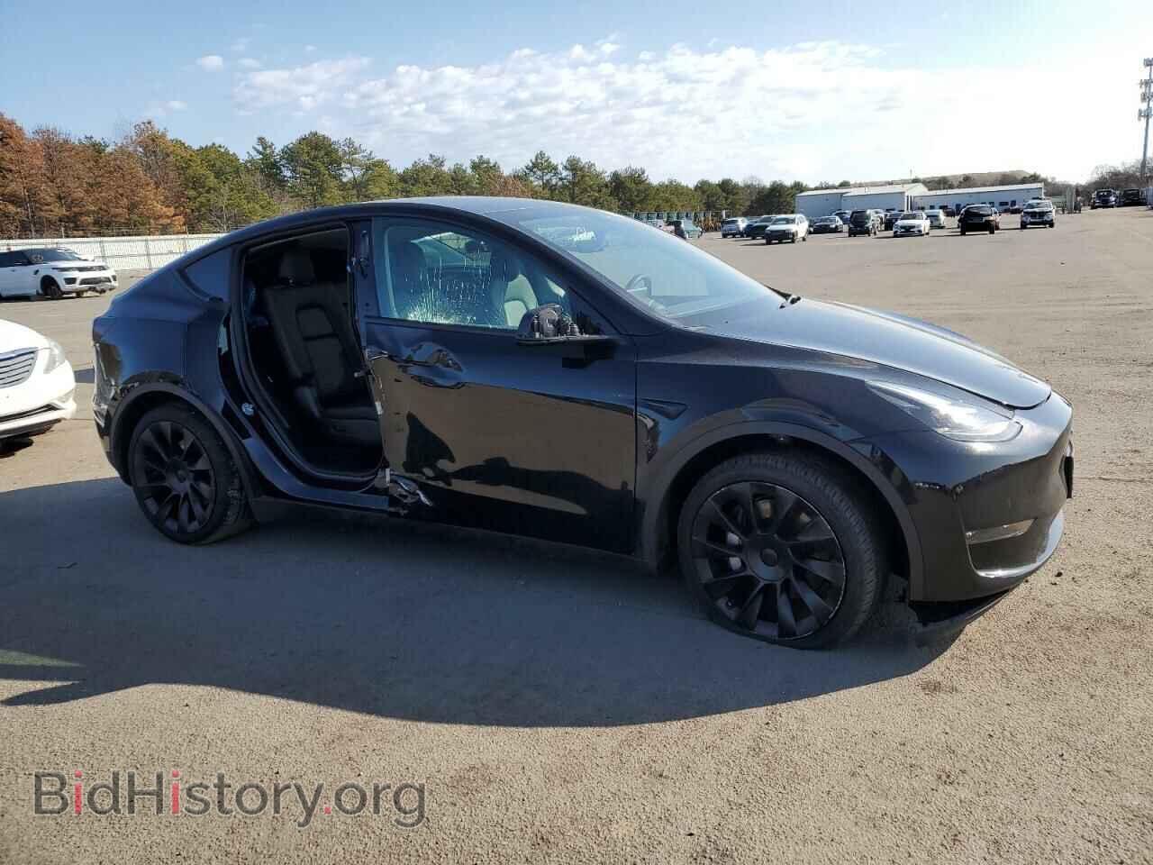 2023 TESLA MODEL Y - VIN: 7SAYGAEE0PF608544 - Photo 4