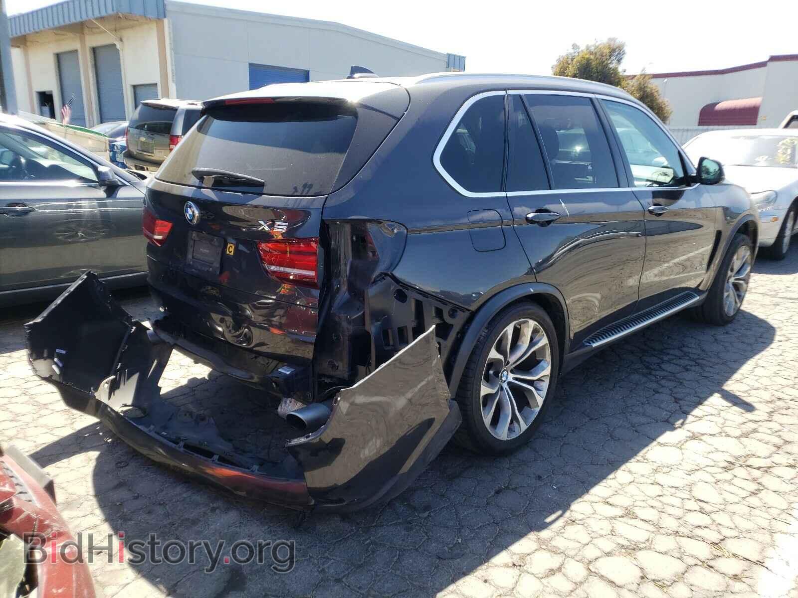 2014 BMW X5 - VIN: 5UXKR2C58E0H31432 - Фото 4