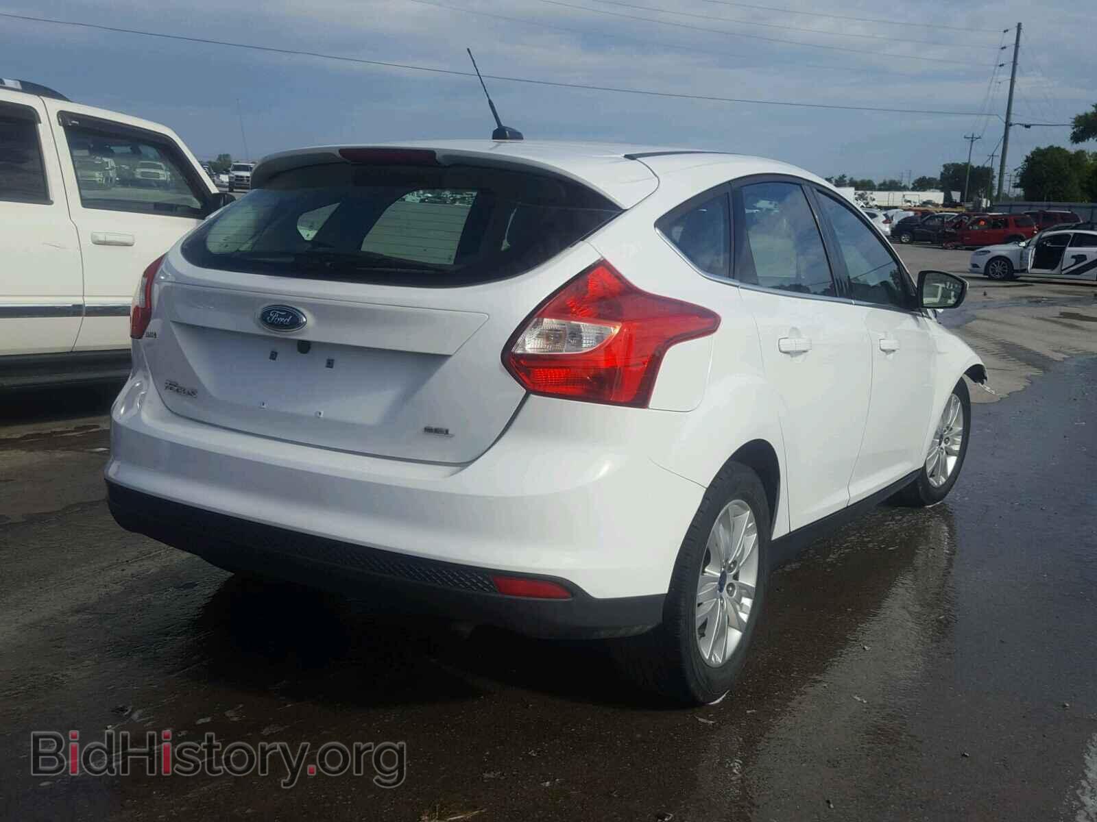 2012 Ford FOCUS (VIN 1FAHP3M21CL219702) — фото 4 из 10