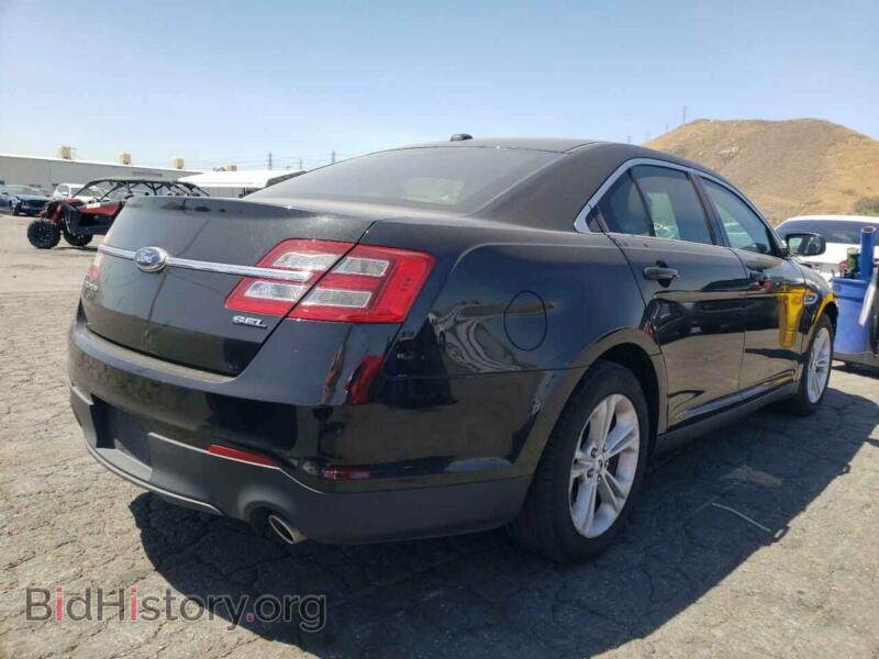 2014 Ford TAURUS (VIN 1FAHP2E85EG131535) — photo 4 of 10