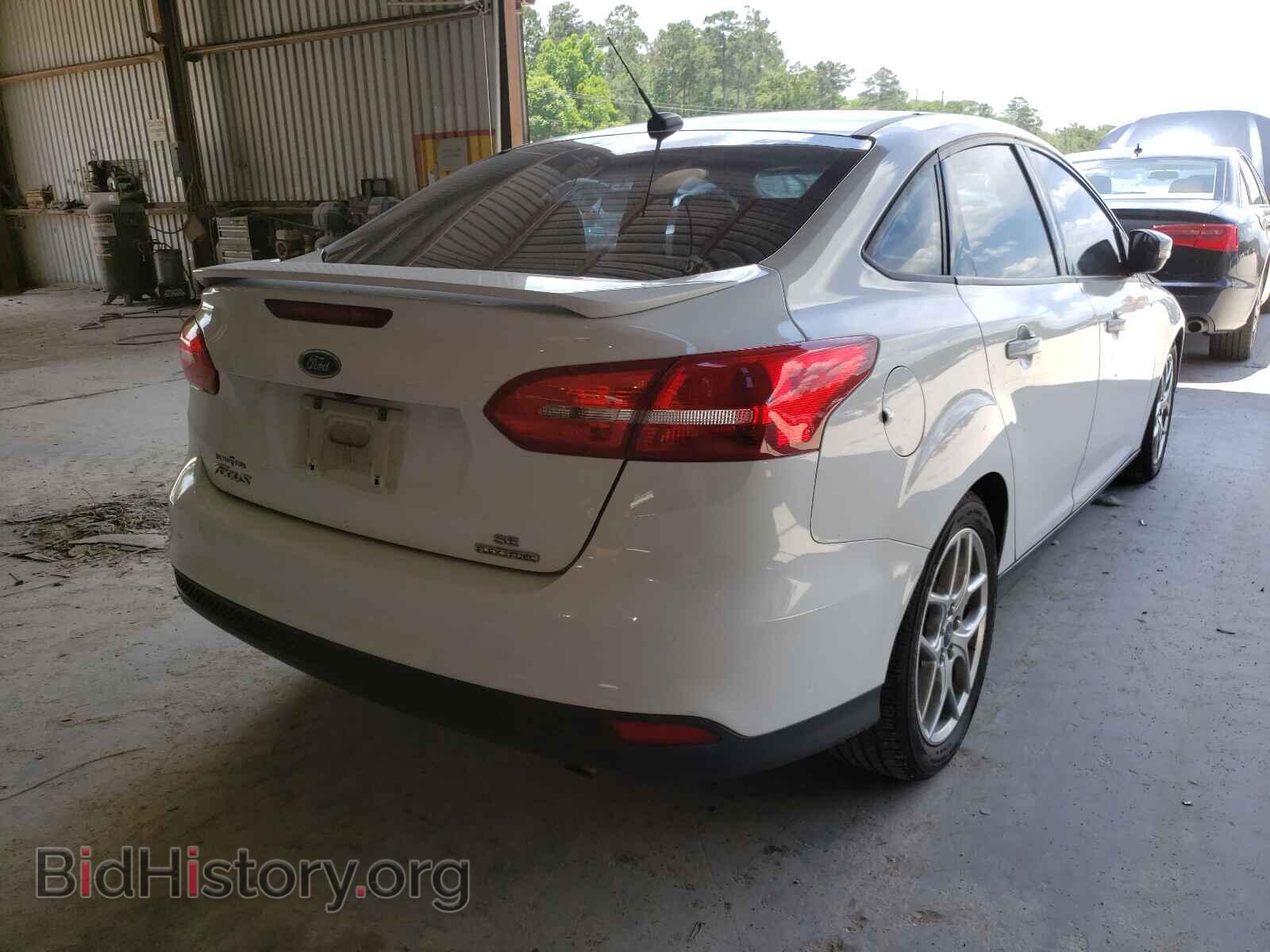 2015 FORD FOCUS - VIN: 1FADP3F21FL215066 - Photo 4