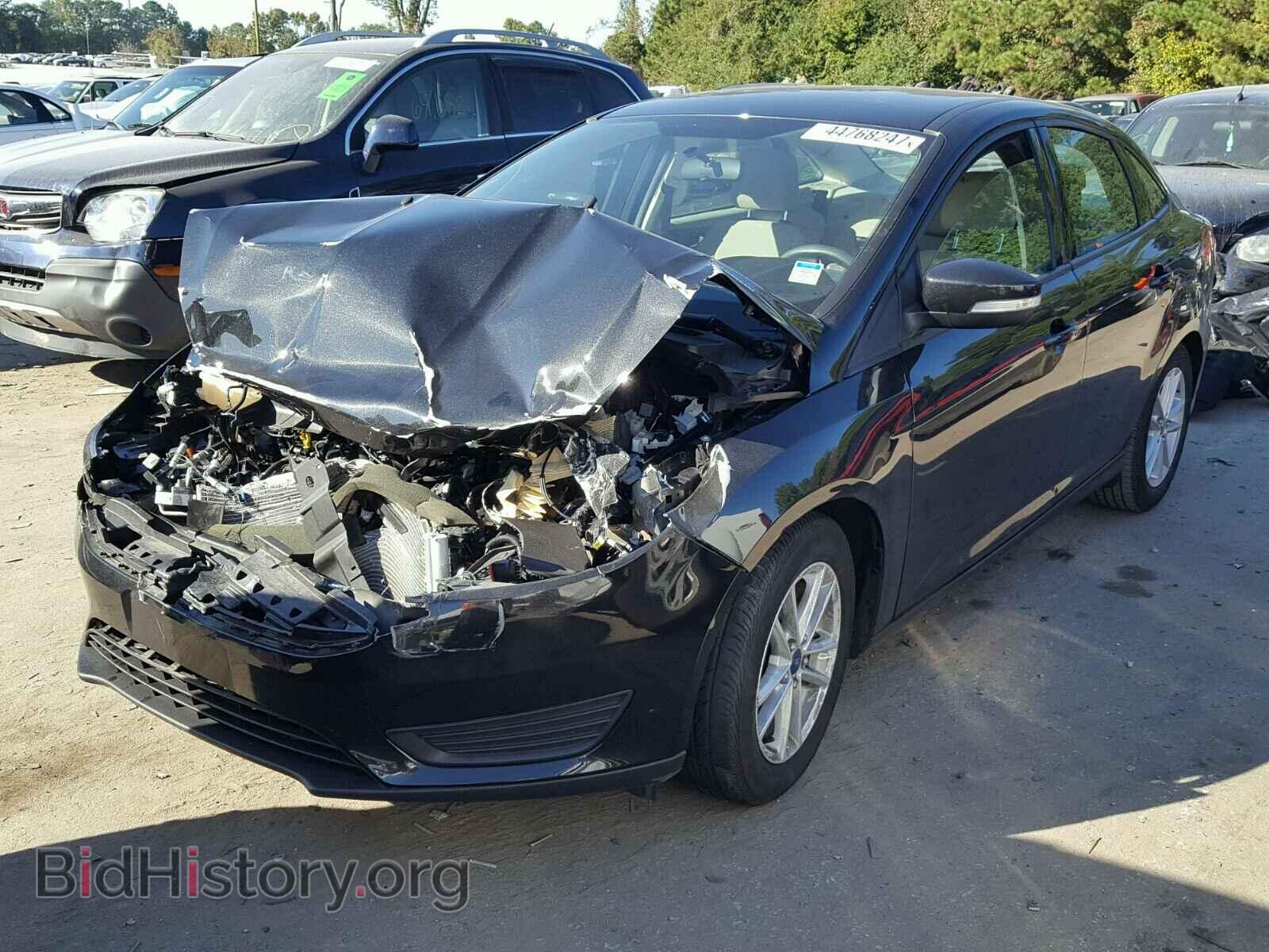 2015 FORD FOCUS - VIN: 1FADP3F21FL279429 - Photo 2