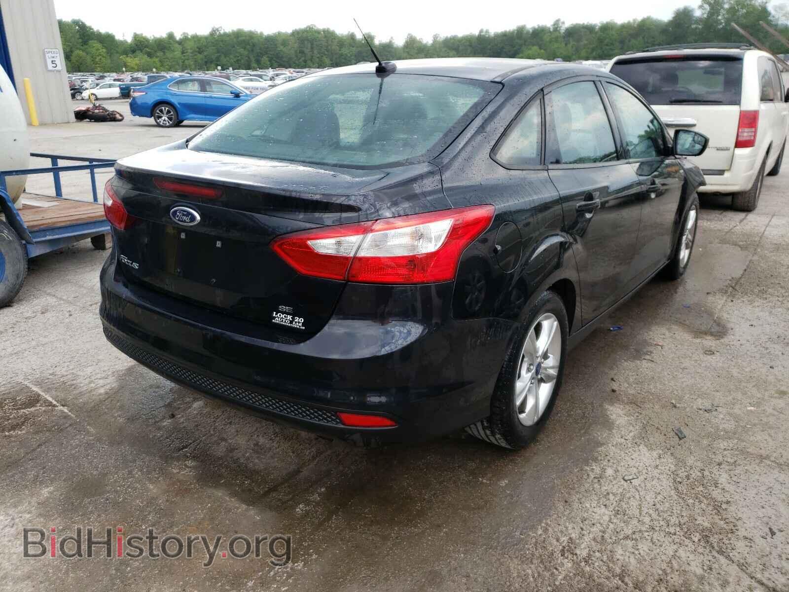 2014 FORD FOCUS - VIN: 1FADP3F21EL245103 - Photo 4